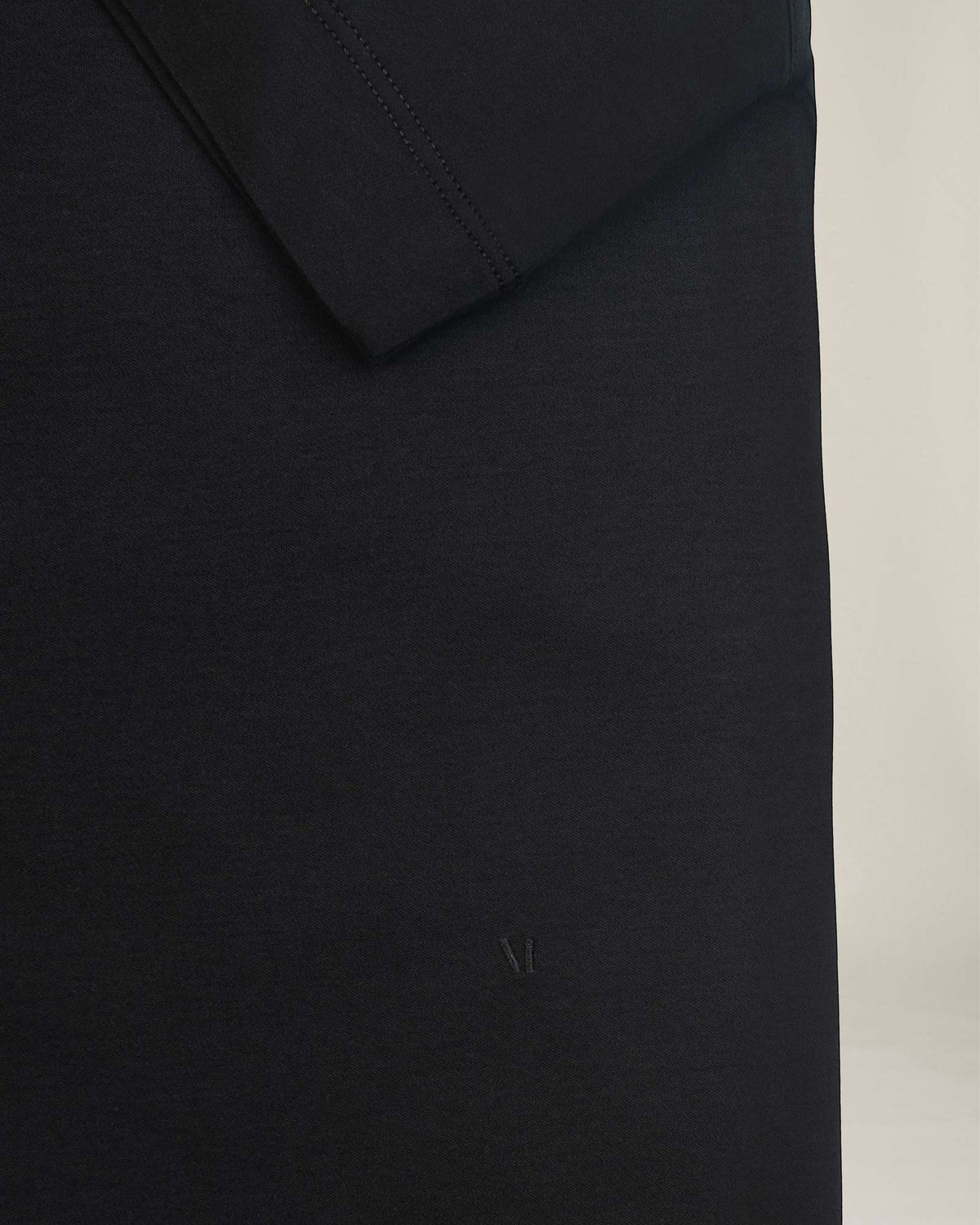 MANGOLA-T-Shirt_men_black_flatflay_detail2 #color_black